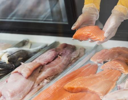 fresh fish filets at market